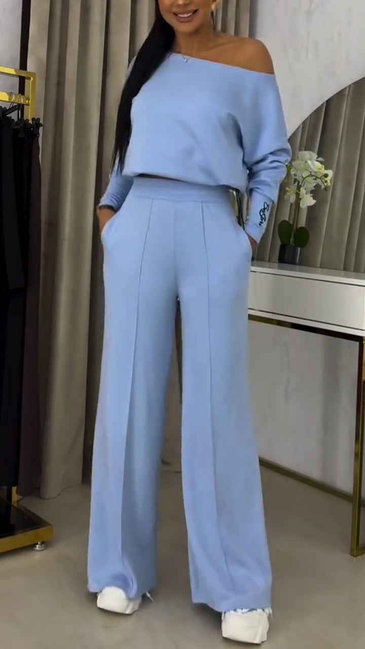 Γυναικείο κοστούμι με φαρδιά μπλούζα με έξω τους ώμους και casual παντελόνι-GR