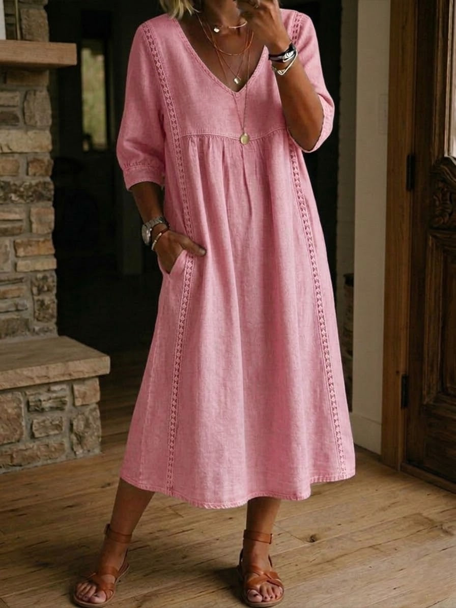 Un vestido holgado e informal confeccionado en lino y algodón con ribete de encaje.-ES