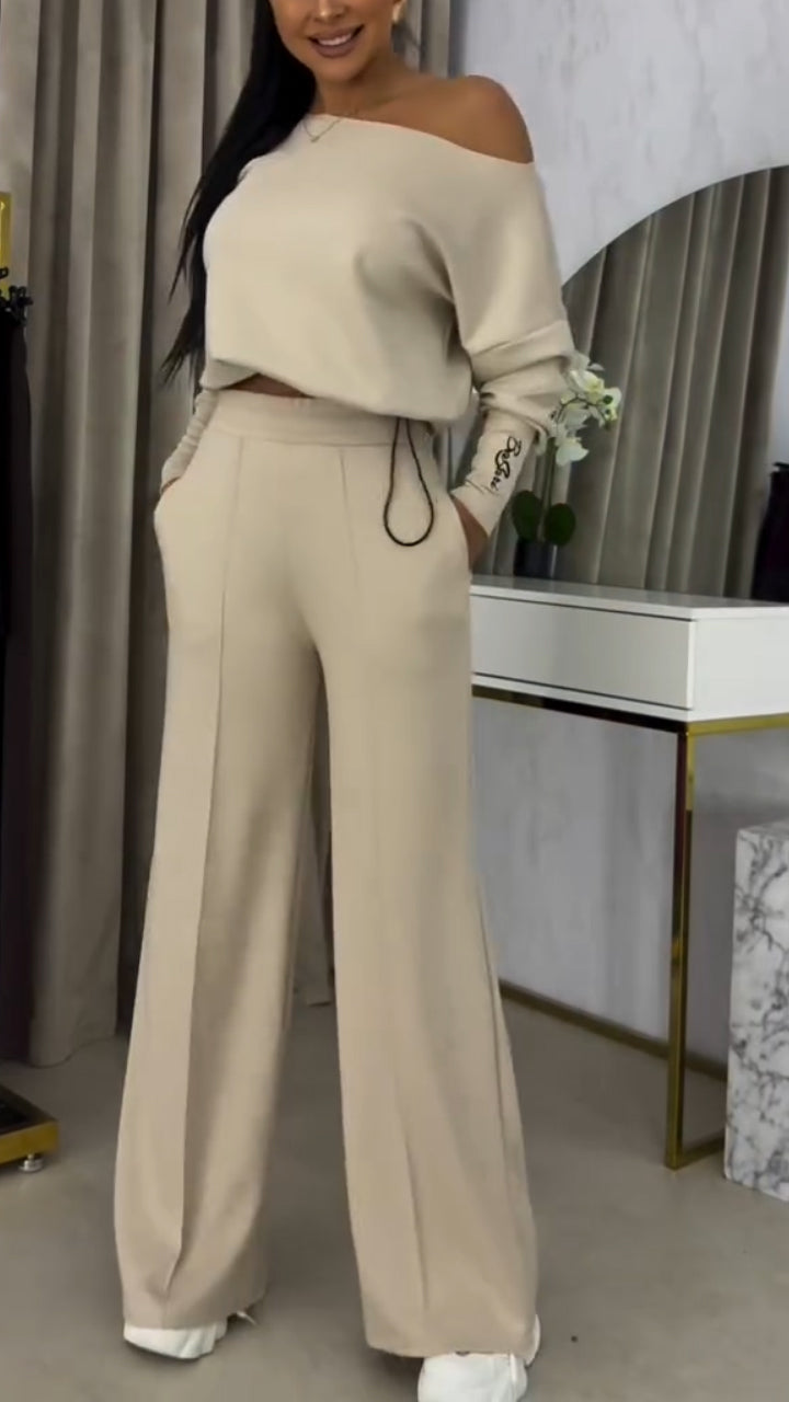 Γυναικείο κοστούμι με φαρδιά μπλούζα με έξω τους ώμους και casual παντελόνι-GR