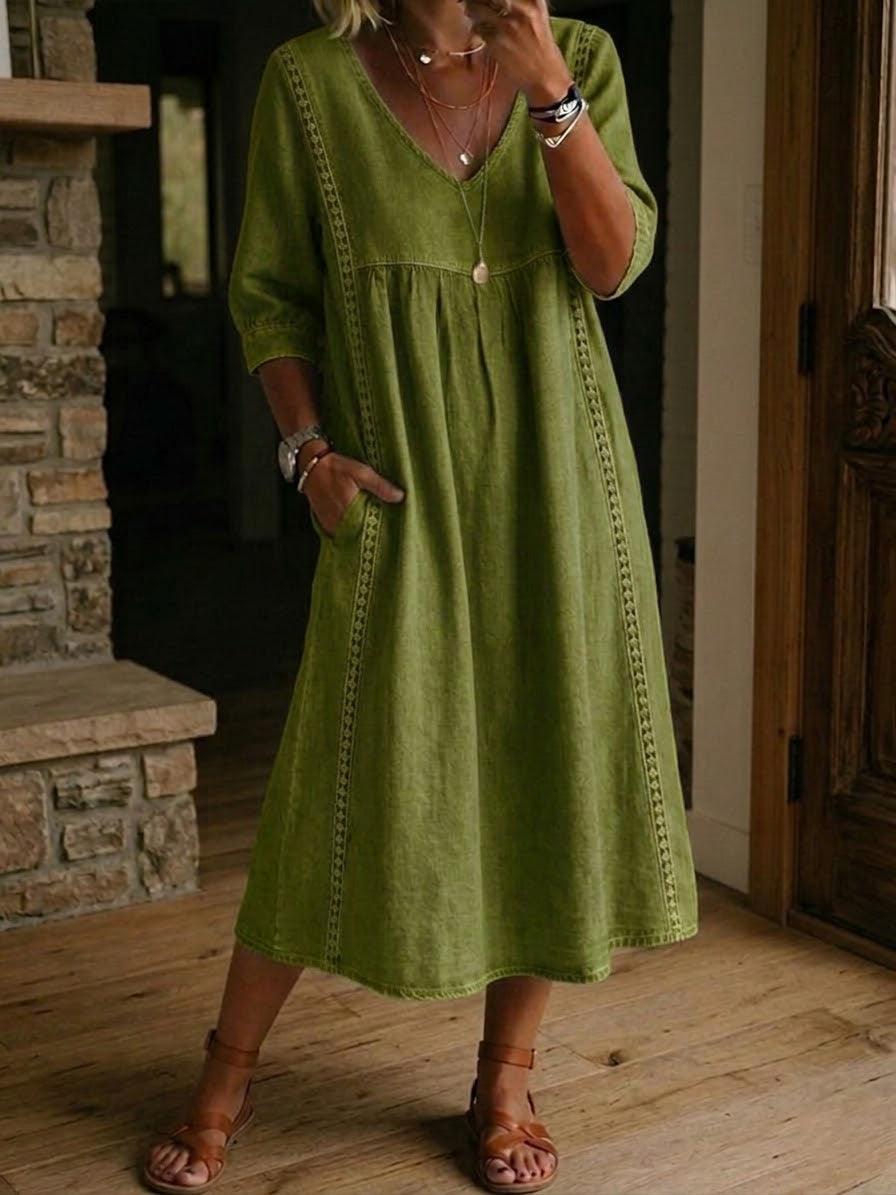 Un vestido holgado e informal confeccionado en lino y algodón con ribete de encaje.-ES