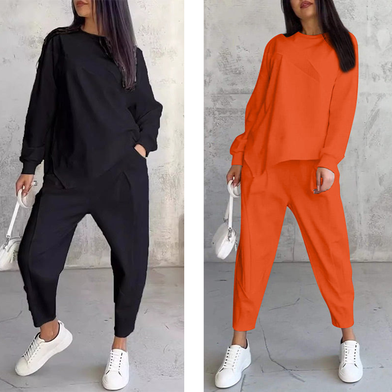 Conjunto femenino compuesto por una blusa de manga larga y pantalones con bajo irregular.-ES