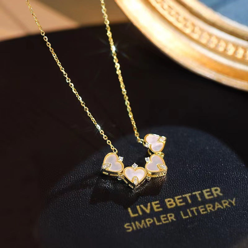 Collar con micro engaste de perlas y circonitas, forma cuarto de concha-ES