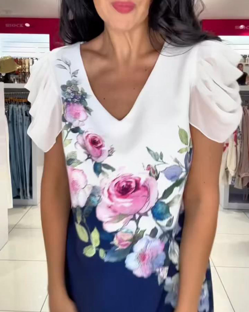Vestido con mangas abullonadas y escote en pico, con estampado floral en color rosa.-ES