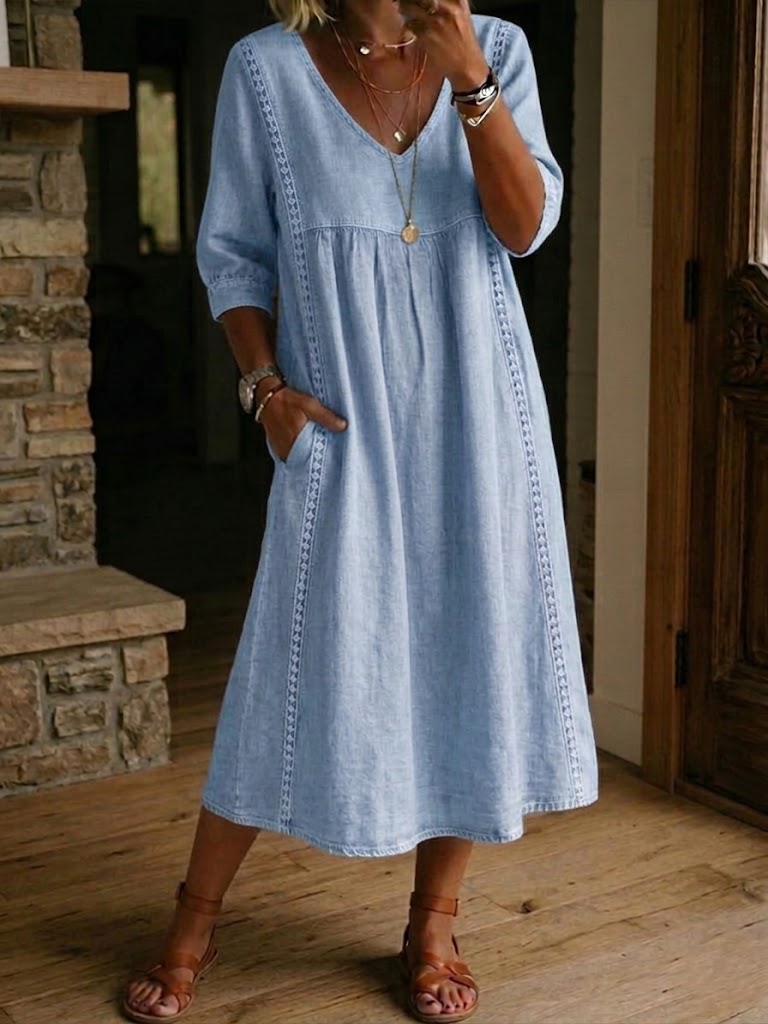 Un vestido holgado e informal confeccionado en lino y algodón con ribete de encaje.-ES