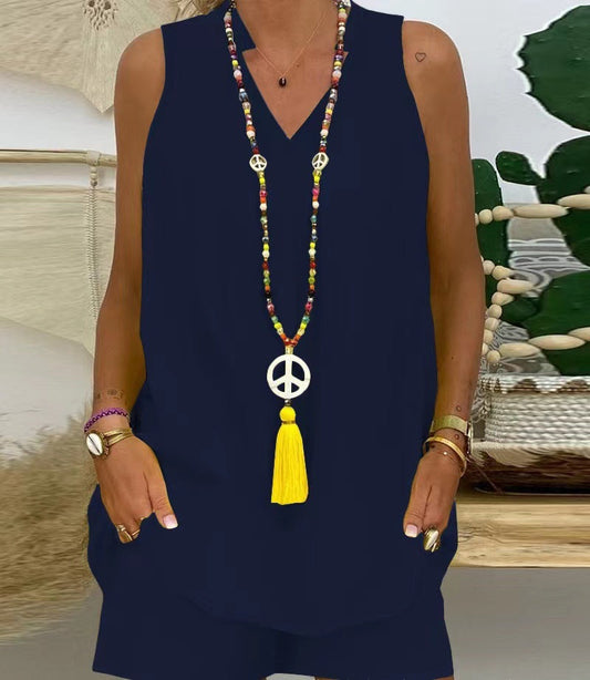 Elegante conjunto de dos piezas: manga corta escote en pico + pantalón corto-ES