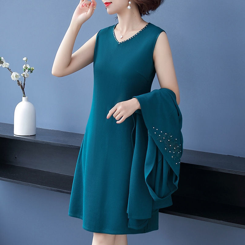 Elegante conjunto de dos piezas para mujer con chaqueta y vestido.-ES